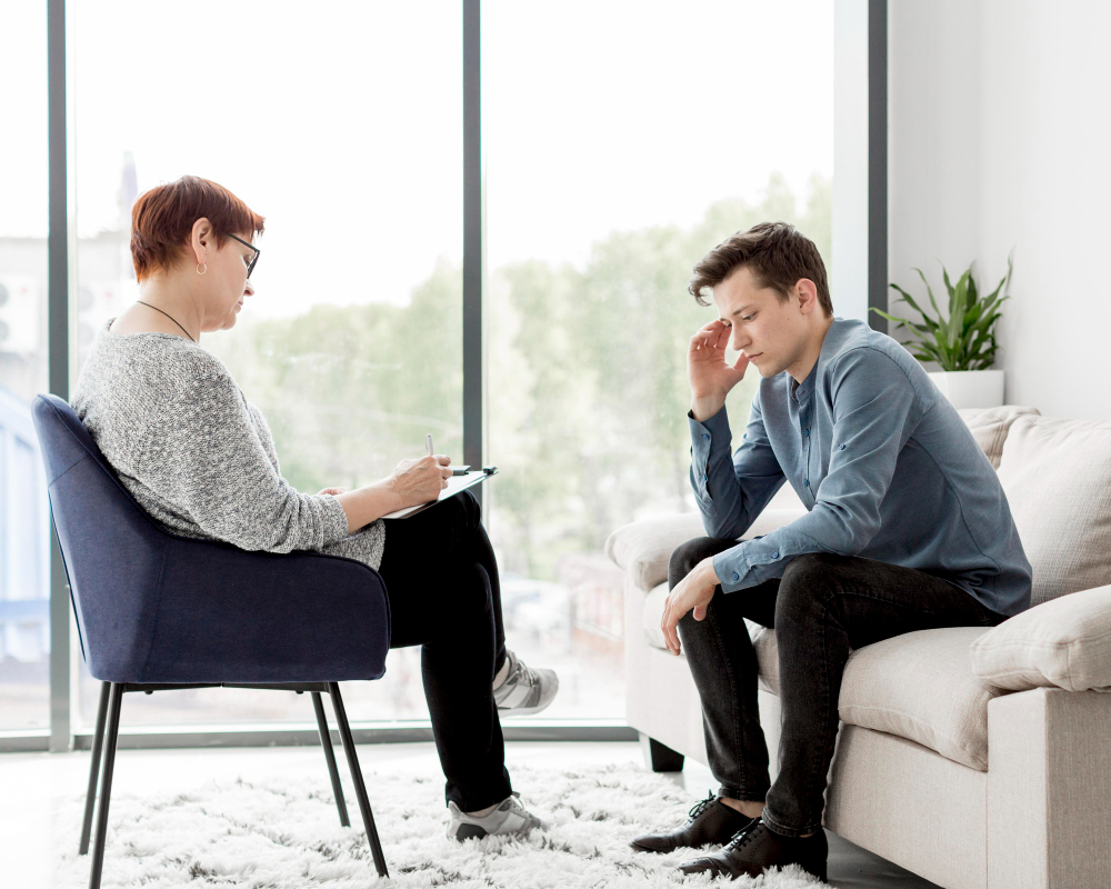 Psychiatric provider discussing mental health evaluation and treatment options with a patient in Connecticut